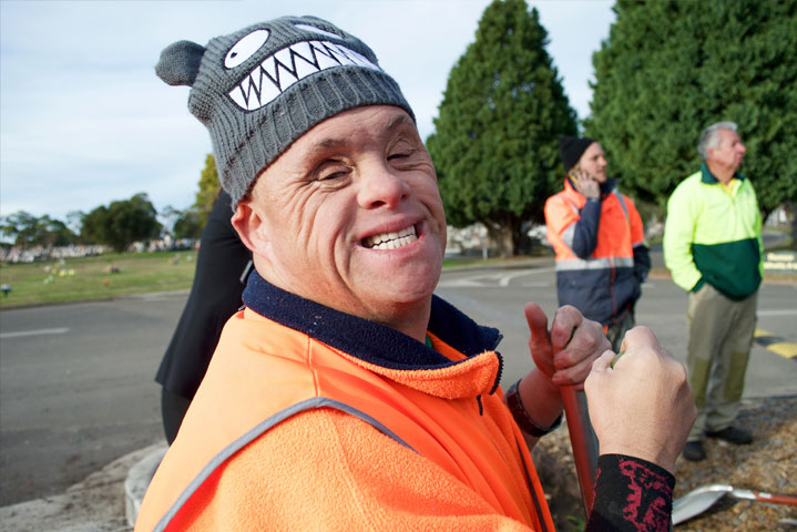 Civic client, Chris, smiling while at work.