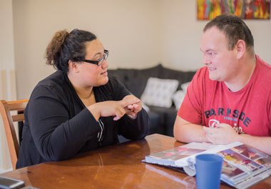 Civic staff member instructing a Civic client.