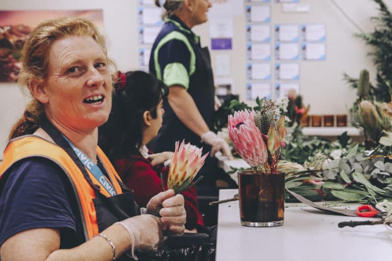 Civic crew hard at work arranging flowers with the Ring O’ Roses social enterprise