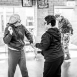 Disabled persons having a dance in a community hall