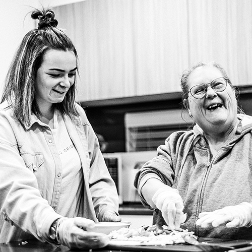 Civic Kitchen & Catering staff chopping vegetables