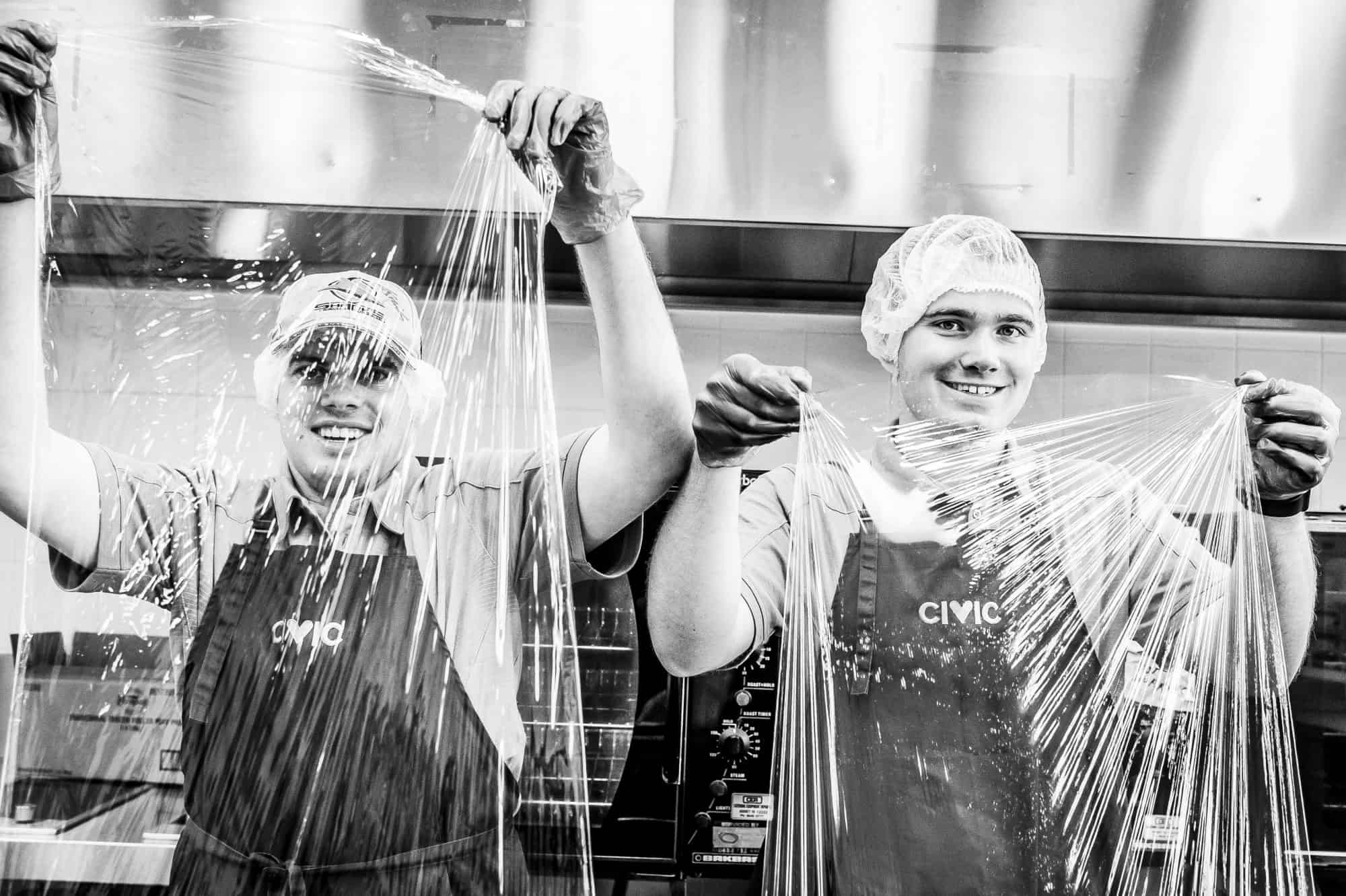 Civic Café Engadine staff wrapping food in clingfilm