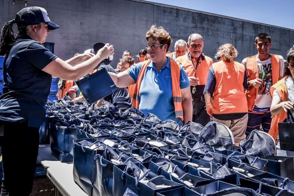 Civic crew receiving True Blue kit bags 