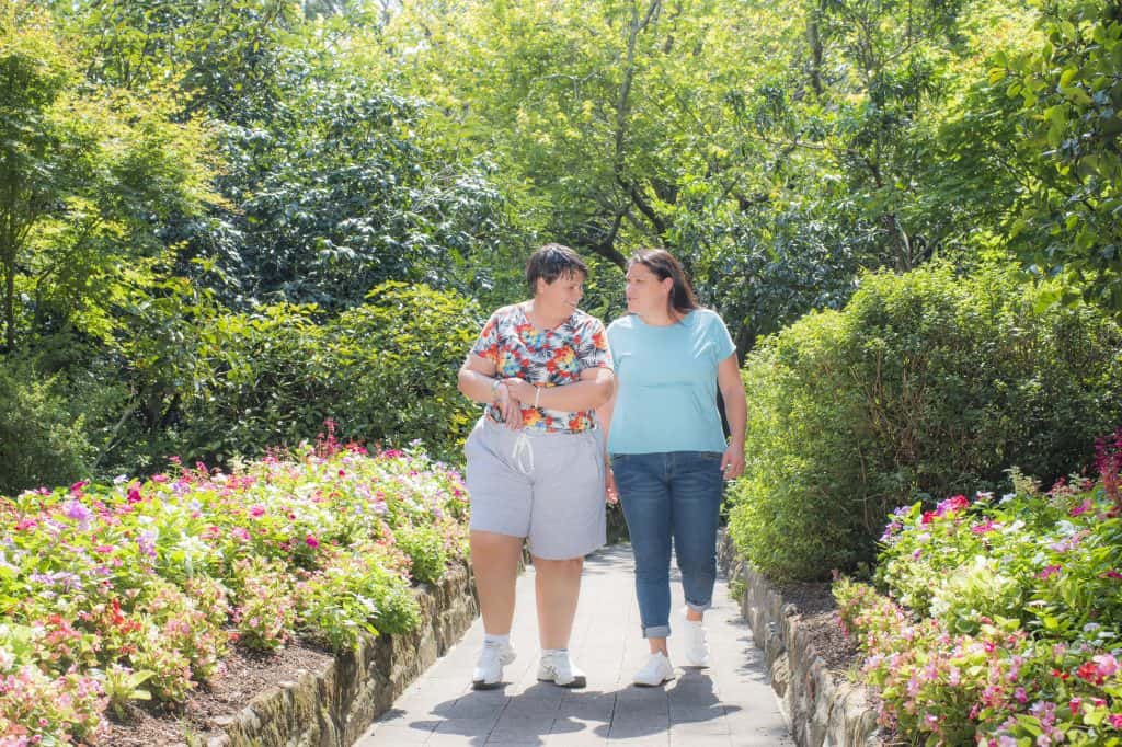 Jasmin (right) - Volunteer with Civic’s Ring O’ Roses Program