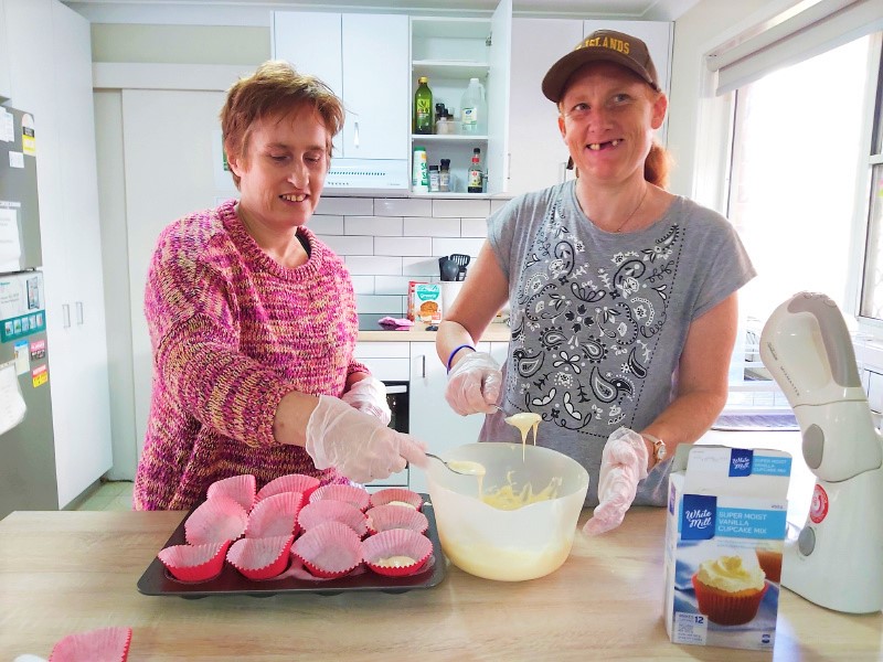 Civic clients baking cupcakes