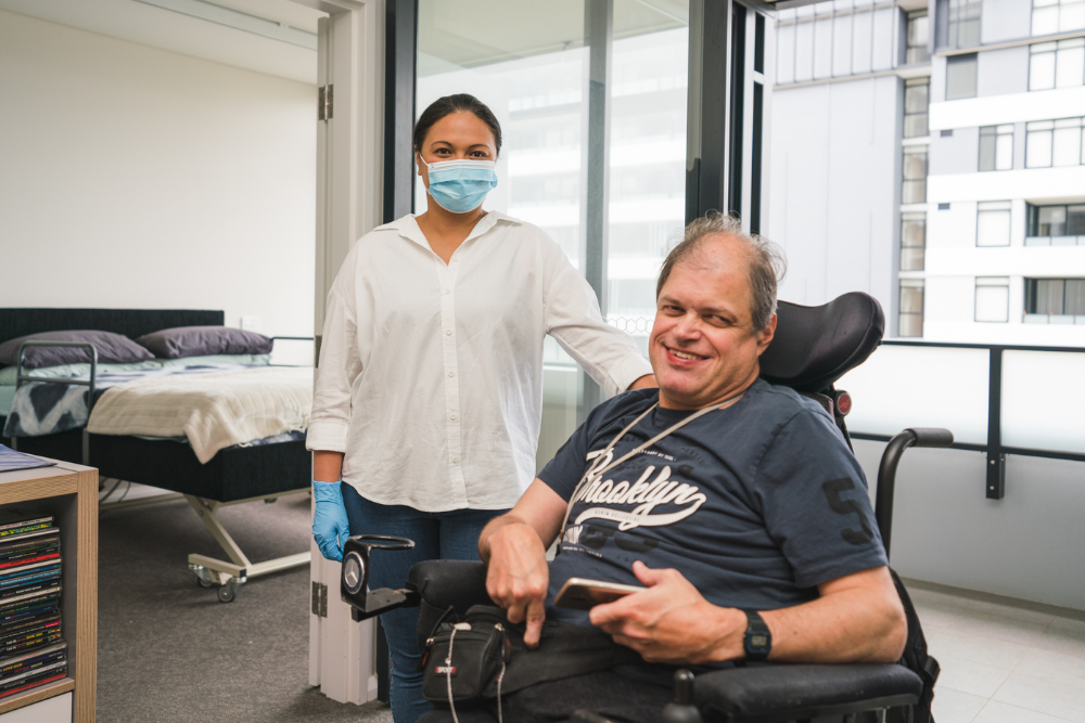 Person in wheelchair and support worker