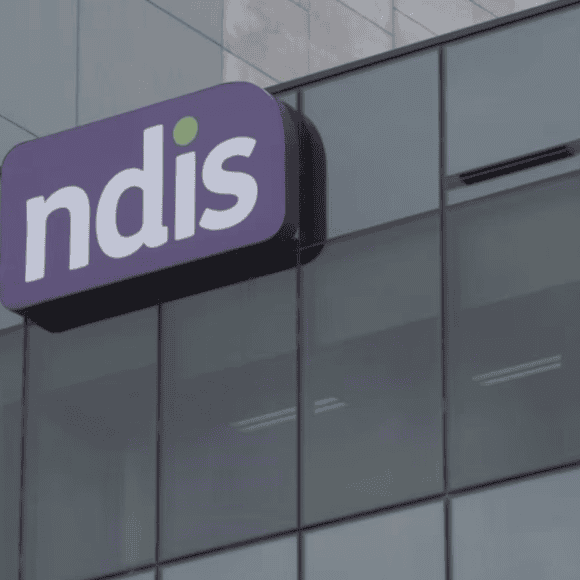 outside of NDIS office showing NDIS logo on building
