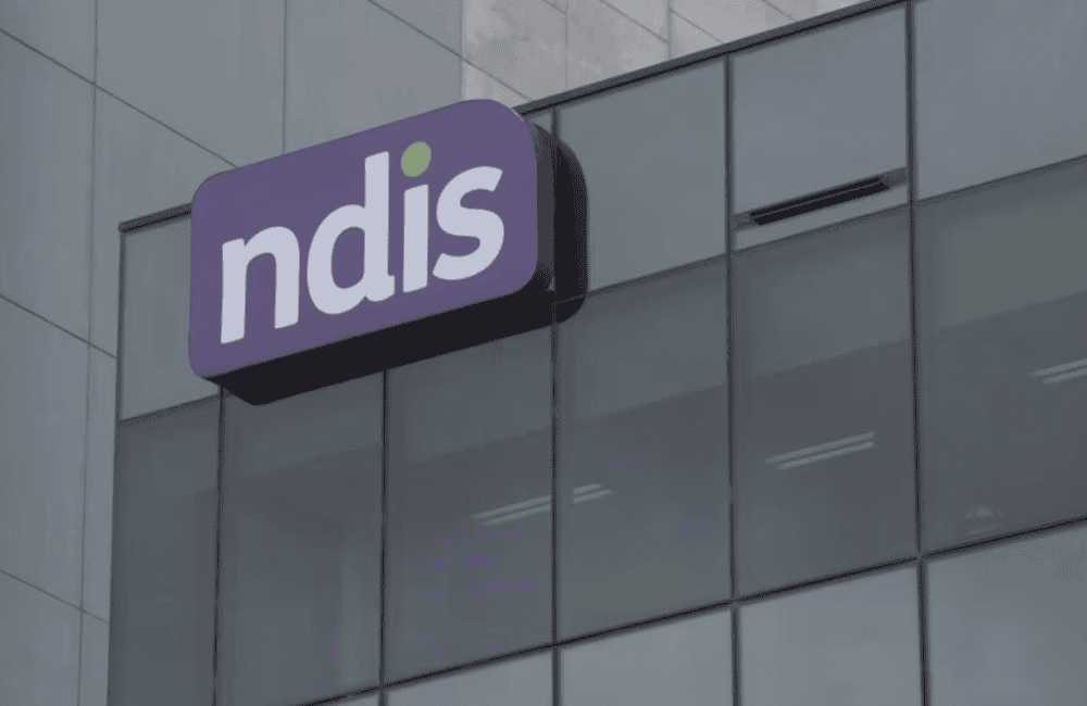 outside of NDIS office showing NDIS logo on building